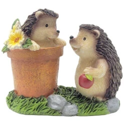 Two Hedgehogs Playing In A Flower Pot Figurine